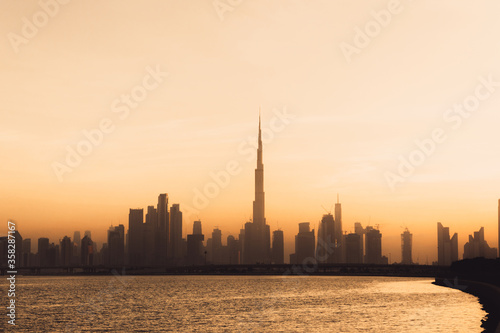 WOW Dubai Skyline during dust storm. Golden hour. Travel concept. 