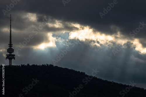 Sunbeams through the dark clouds over Black Mountain