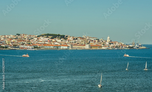 wide river with boats. river shoreline near Lisbon