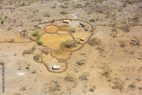 Traditional Masai dwelling in the Great Rift Valley, Kenya. The Great Rift Valley is part of an intra-continental ridge system that runs through Kenya from north to south. photo