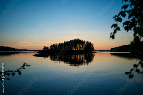Fototapeta Naklejka Na Ścianę i Meble -  finnish summer sunset midsummer bright outside lakeside