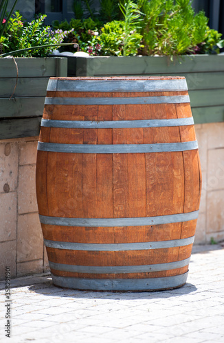 wooden barrel with metal hoops for wine
