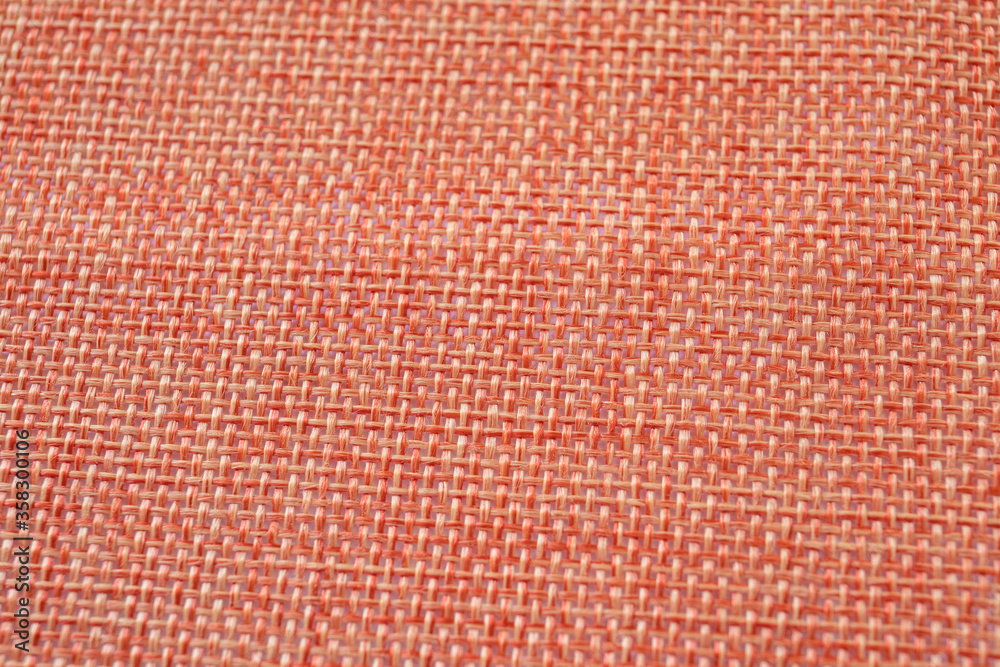 Fototapeta premium Orange textiles. Fabric for decoration, embroidery, backgrounds and creative works
