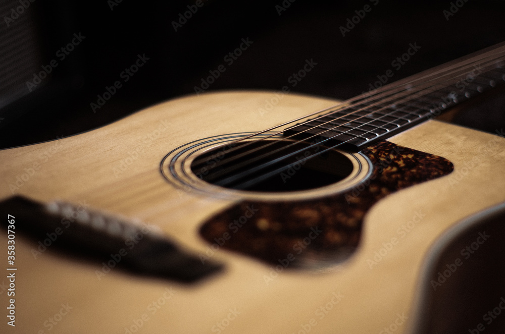 Fototapeta premium Acoustic Guitar on Black Background
