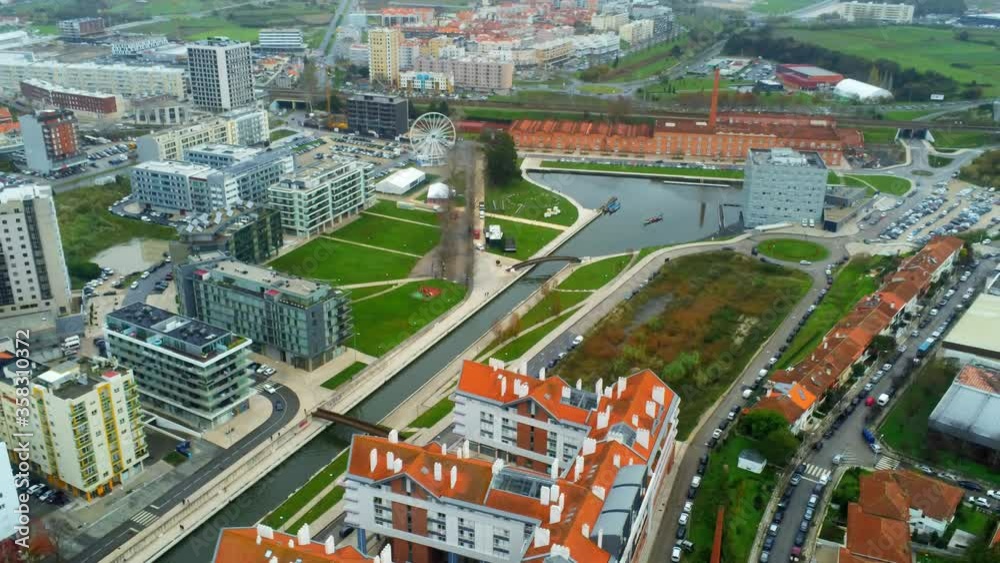 Buildings and canal in Aveiro , beautiful village named the Venice of Portugal Buildings and canal in Aveiro , beautiful village named the Venice of Portugal