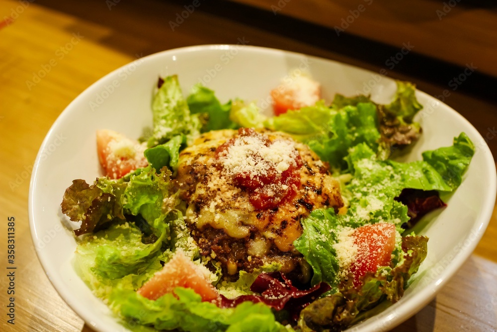 Taco Rice, a dish very popular in Okinawa Japan, with burned cheese on top Taco Rice, a dish very popular in Okinawa Japan, with burned cheese on top