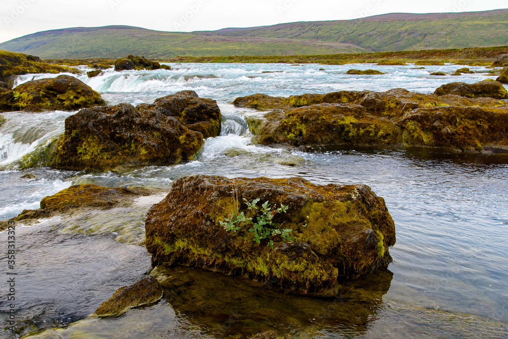 Godafoss (waterfall of the gods) in the Bardardalur district of Northeastern Region of Iceland Godafoss (waterfall of the gods) in the Bardardalur district of Northeastern Region of Iceland