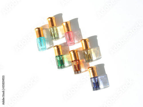 Arabian oud attar perfume in mini bottles. photo