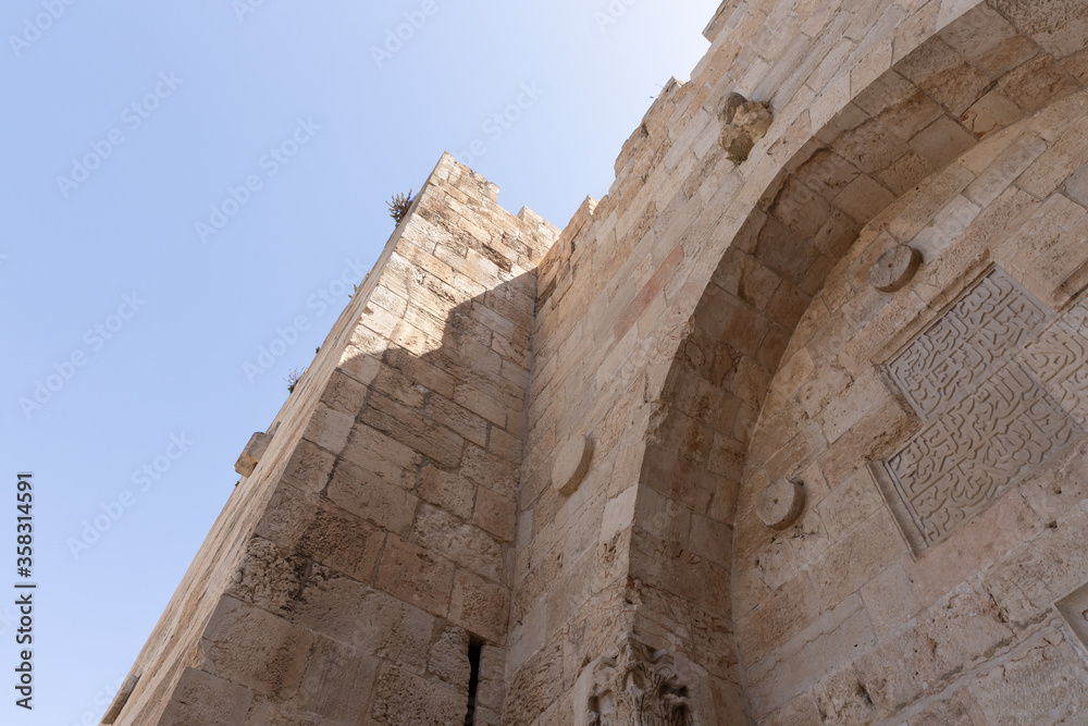 Fragment of the fortress wall encircling the old city in the Jaffa Gate area in the old city of Jerusalem in Israel
