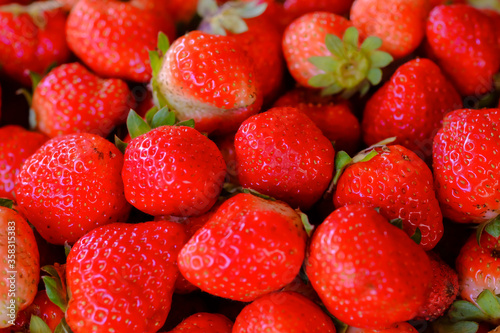 Strawberries red mellow ripe perfect. Healthy fresh strawberries are grown in a greenhouse on an organic farm. Royalty high-quality free stock image of fruit.