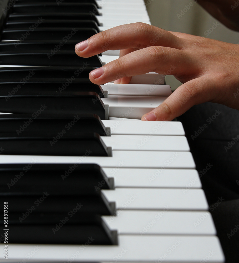 Fototapeta premium hands playing piano