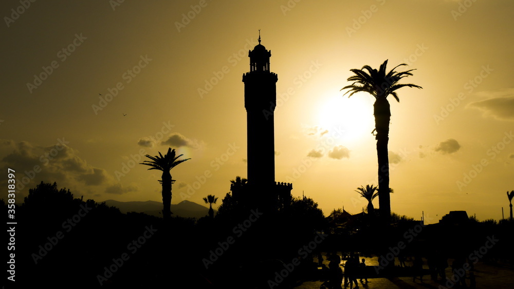 izmir clock tower silhouette time lapse on Konak Square at sunset.