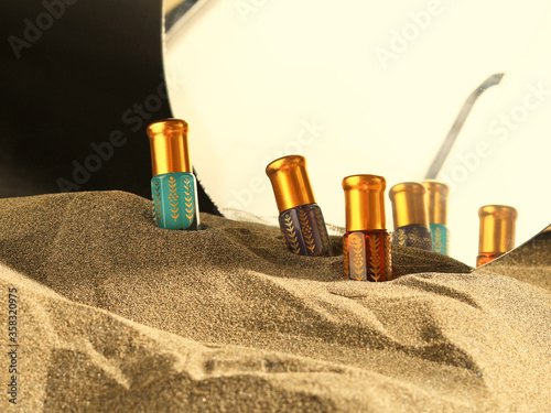 Arabian oud attar perfume in mini bottles. photo