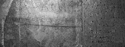 Empty rusty black and white corrosion and oxidized background, panorama, banner. Grunge rusted metal texture. Worn metallic iron wall.