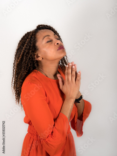 African American woman praying