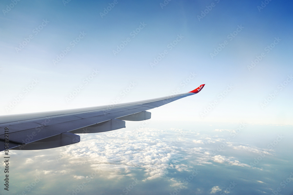 Fototapeta premium View outside airplane window. Air asia boeing