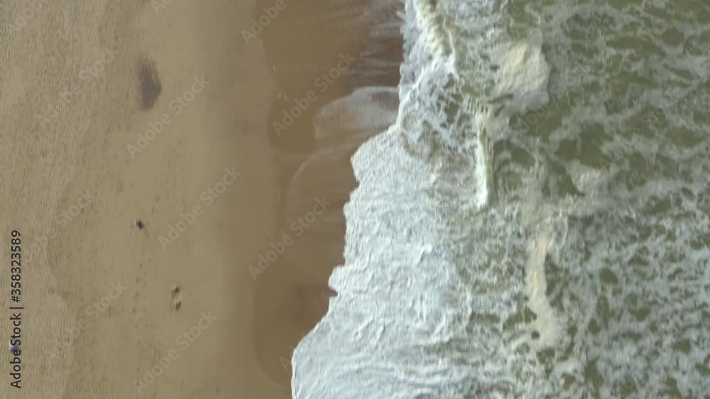Slow reveal shot of amazing, beautiful, endless British coast line and the golden sand beaches Slow reveal shot of amazing, beautiful, endless British coast line and the golden sand beaches