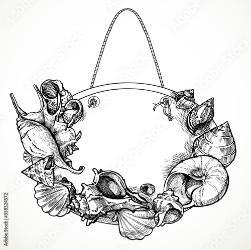 Sign on a rope with shells