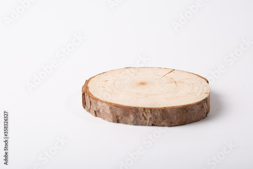 Stump and annual rings on white background