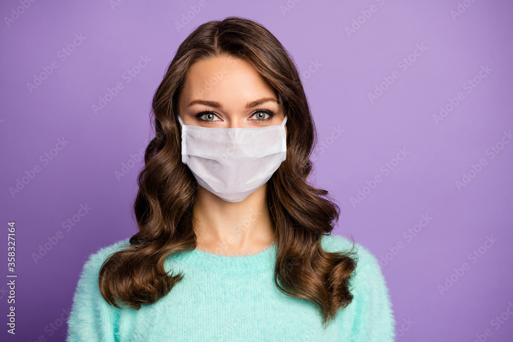 Close-up portrait of her she nice attractive healthy wavy-haired lady wearing safety mask stop pandemia contagious virus viral pneumonia respiratory disease isolated purple pastel color background Close-up portrait of her she nice attractive healthy wavy-haired lady wearing safety mask stop pandemia contagious virus viral pneumonia respiratory disease isolated purple pastel color background