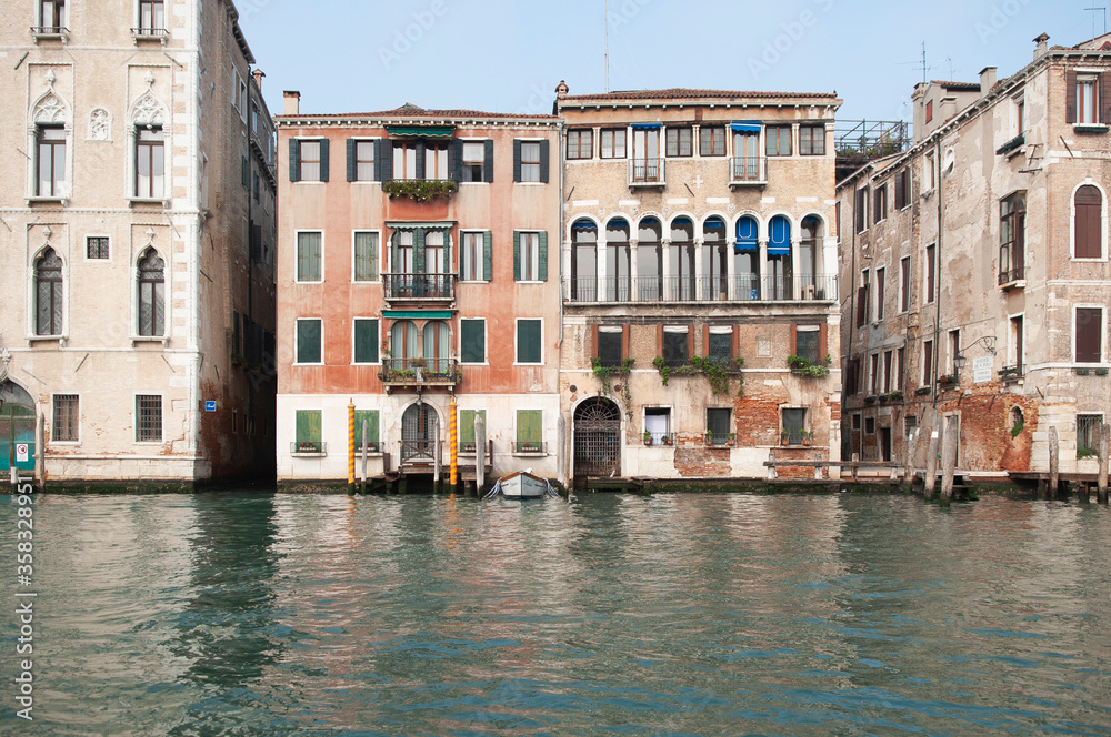 Fototapeta premium A day trip to Venice on a gondola in the Grand Canal