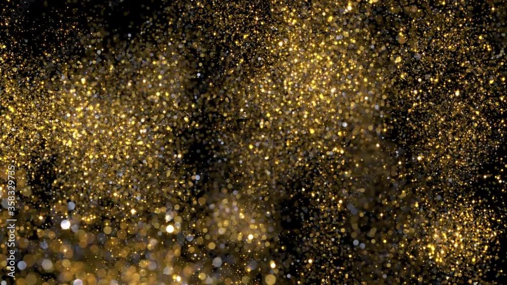fireworks of golden glittering confetti