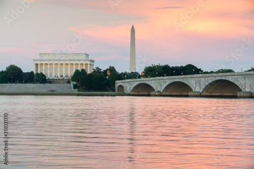 Arlington memorial bridge in Washington D.C. at sunset with Lincoln memorial in the background