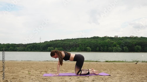 Young woman doing yoga exercise 