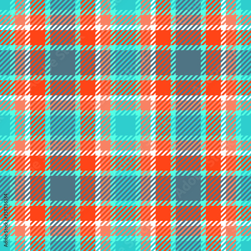 Seamless checkered plaid pattern. Traditional tartan textile ornament in blue and red colors. For textile design