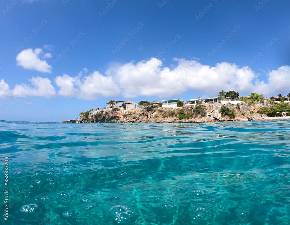 Crystal Blue Waters of Curacao and Coastline Cliffs