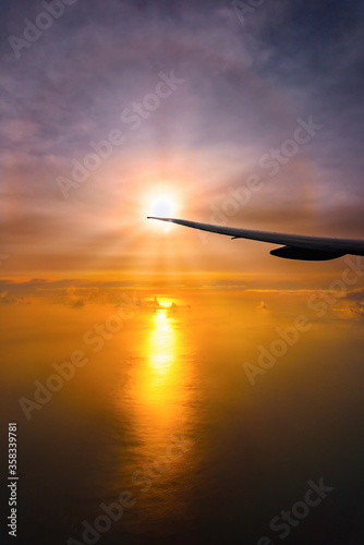  wing and cloud floating on sky on sunset.