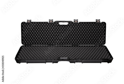 Hard plastic case for storing and transporting weapons. Black gun case with foam inside isolate on a white back.