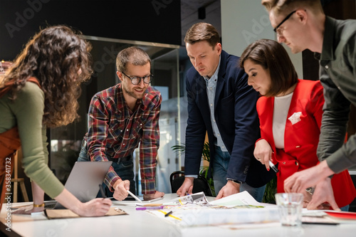 Architects Team Are Working On Paper Blueprint. Business Woman Suggest Idea To Designer. Concept Of Construction, Architecture, Development And Creative.