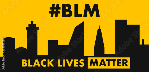 black lives matter hashtag over a city with yellow sky