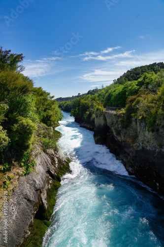 Huka Falls - Waikato River near Taupo on a sunny day - portrait.