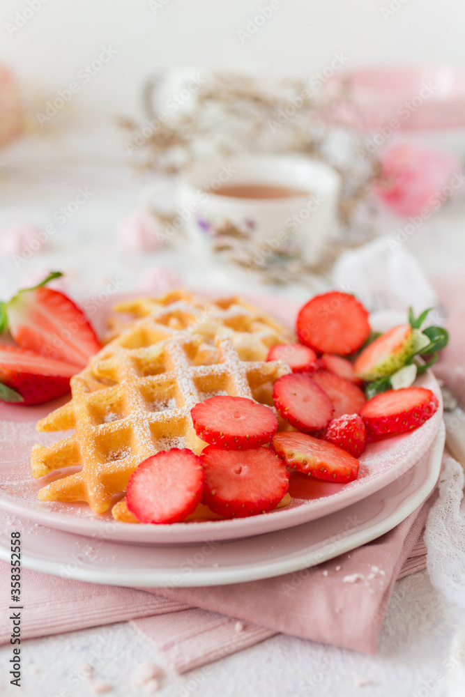 Simple crispy homemade waffles with strawberries Simple crispy homemade waffles with strawberries