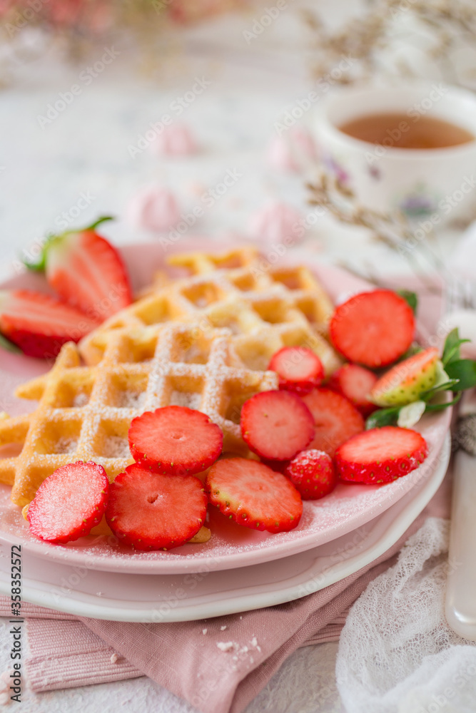 Simple crispy homemade waffles with strawberries