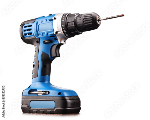 Cordless drill with drill bit working also as screw gun photo