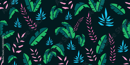 Seamless pattern with tropical leaves on a colourful background, vector illustration