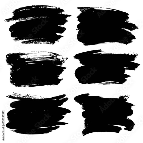 Abstract black thick smear of paint isolated on a white background