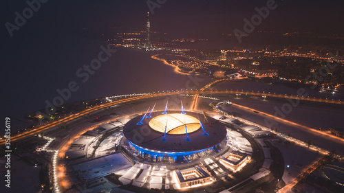 Beautiful aerial view from the bird's eye view of the Gulf of Finland, Saint-Petersburg, Russia, with a stadium, western rapid diameter and cable-stayed bridge, view from quadrocopter drone flight