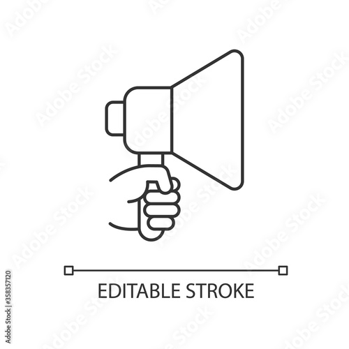 Hand with megaphone pixel perfect linear icon. Bullhorn for announcement. Public propaganda. Thin line customizable illustration. Contour symbol. Vector isolated outline drawing. Editable stroke