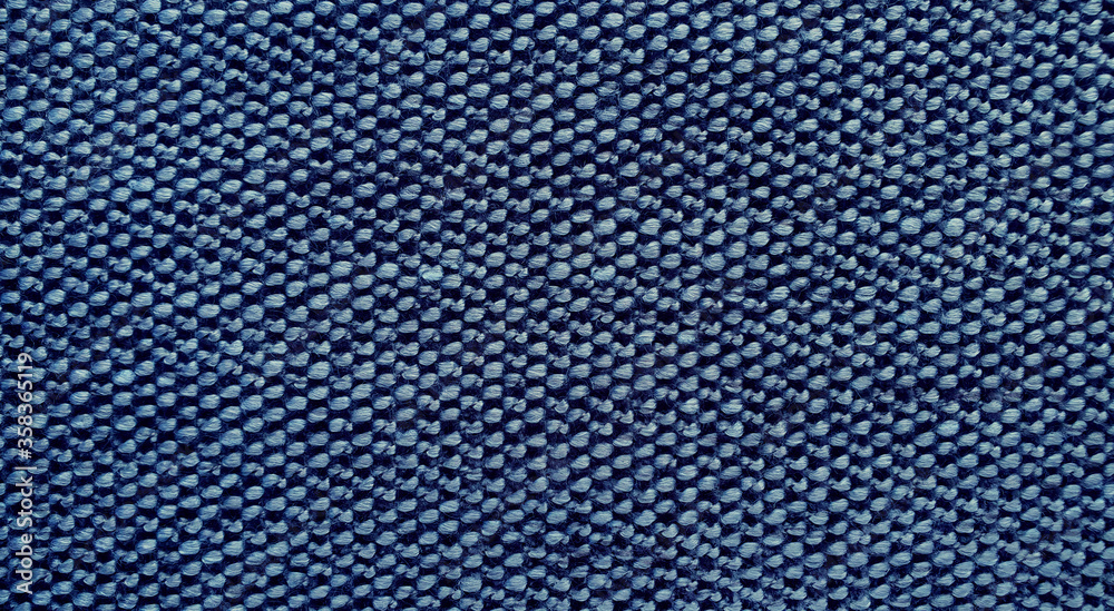 Texture of blue fabric. marco fabric pattern showing sewing background. Texture of blue fabric. marco fabric pattern showing sewing background.
