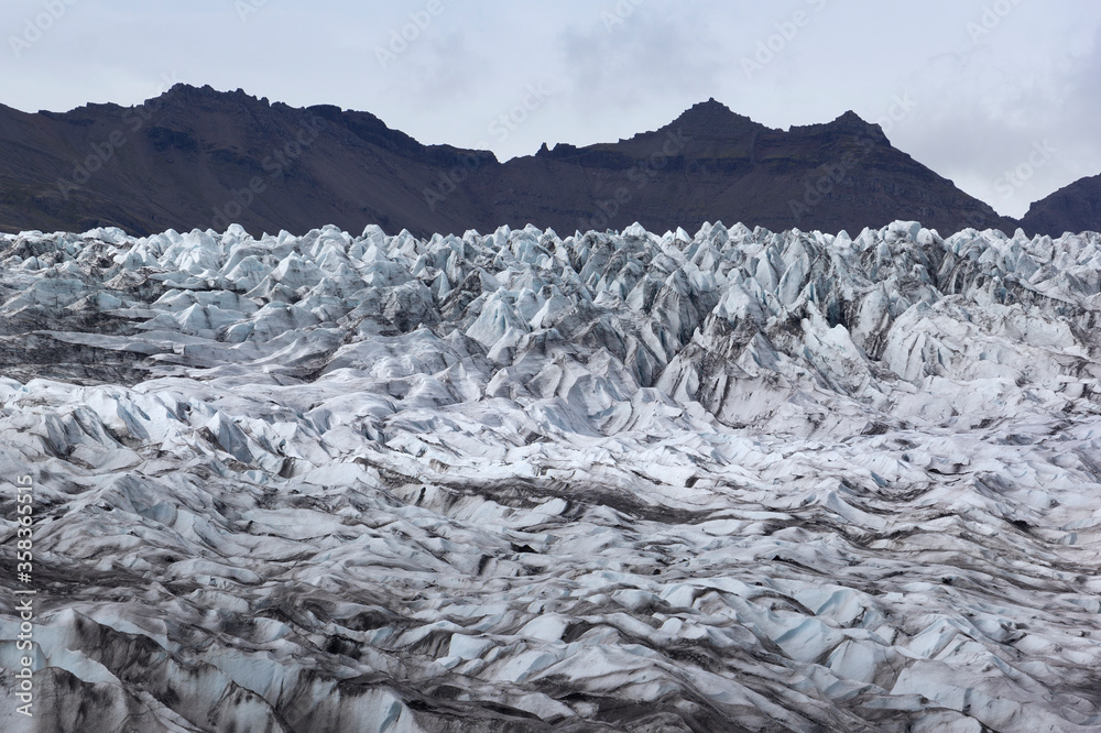 View to the ice front of the glacier Flaajokull in the east of Iceland.