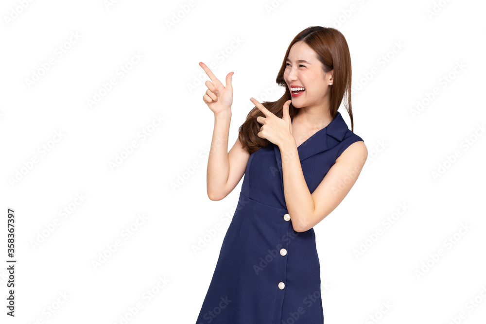 Young elegant beautiful Asian woman smiling and pointing to empty copy space isolated on white background Young elegant beautiful Asian woman smiling and pointing to empty copy space isolated on white background