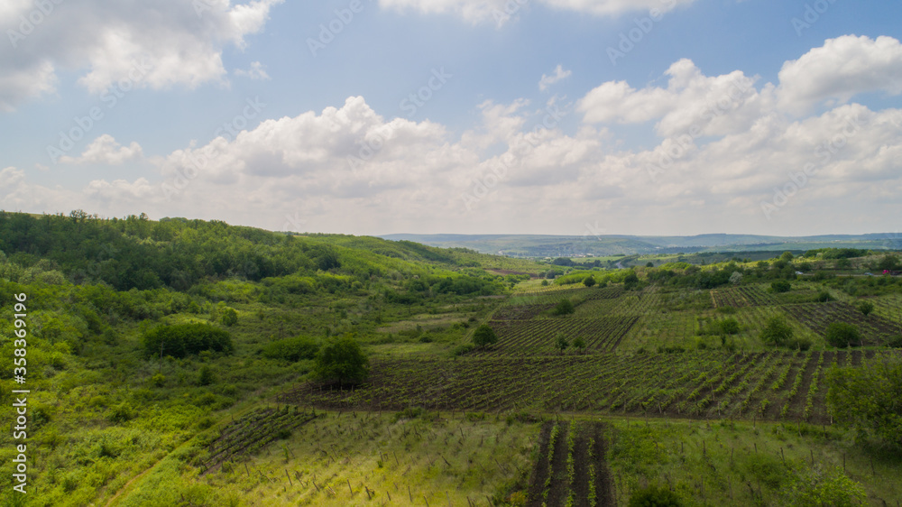 Beautiful view of the hills from a height against a background of white clouds