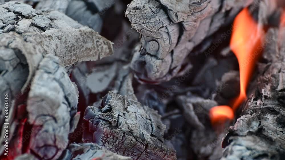 slow smoldering of hot coals on the grill slow smoldering of hot coals on the grill