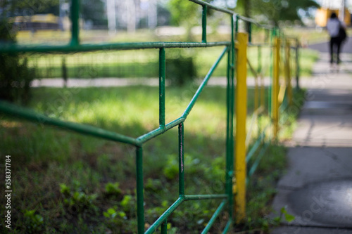 Old abandoned fence on the street