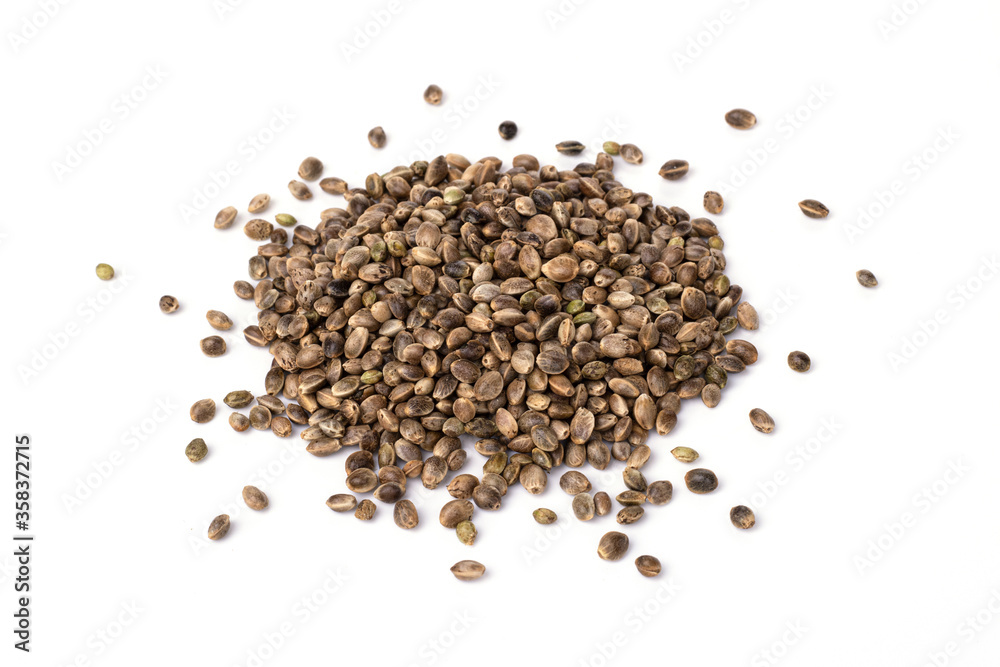 raw hemp seeds isolated on a white background. healthy lifestyle. weight loss and proper nutrition raw hemp seeds isolated on a white background. healthy lifestyle. weight loss and proper nutrition