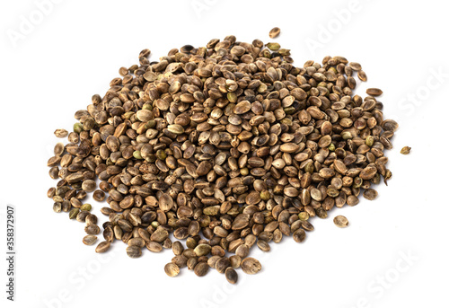 raw hemp seeds isolated on a white background. healthy lifestyle. weight loss and proper nutrition